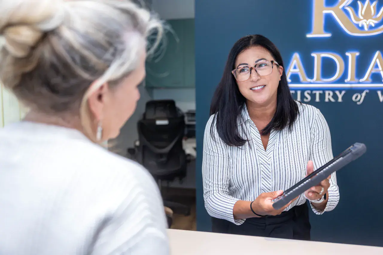 The front desk at Radiant Dentistry of Woburn, where patients enroll in the Dental Savings Plan