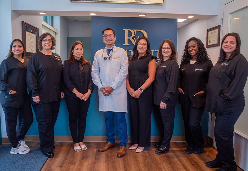 Dr, Austria and his dental team at Radiant Dentistry of Woburn in Woburn, MA